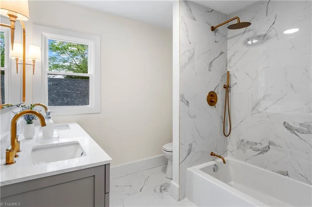 Primary bedroom — Polo Road Dutch Colonial renovation in Winston-Salem, NC