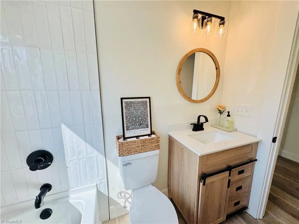Updated plumbing — Dudley Road down-to-studs renovation in Winston-Salem, NC