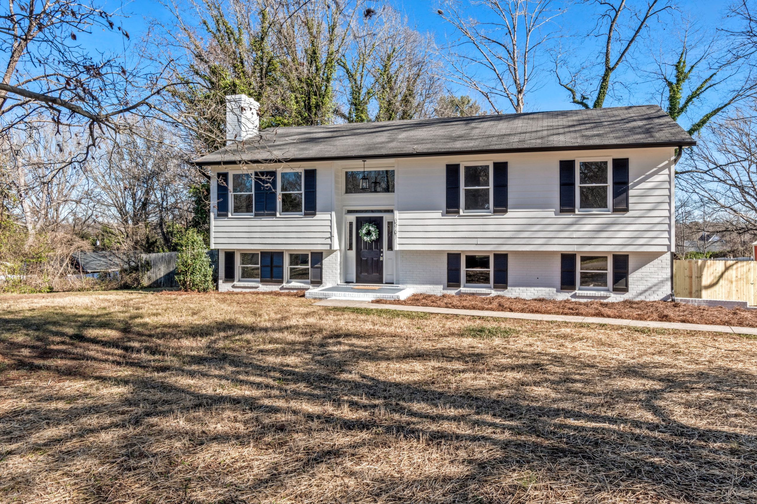 Exterior paint refresh — Wabash Boulevard split-level complete remodel in Winston-Salem, NC