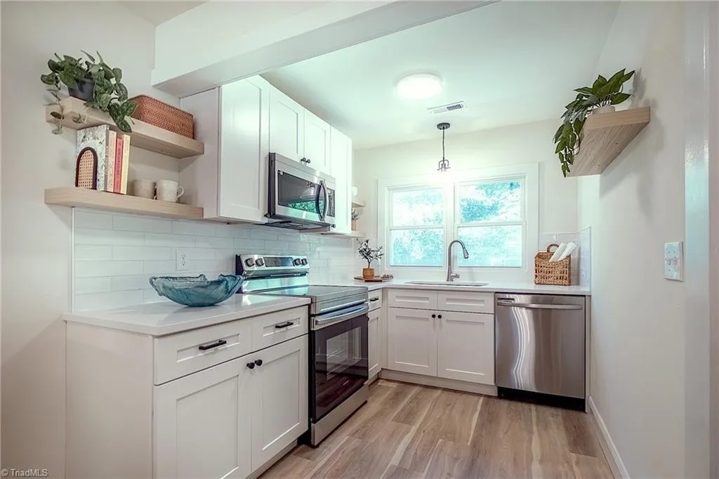 Engineered hardwood floors — Dudley Road down-to-studs renovation in Winston-Salem, NC