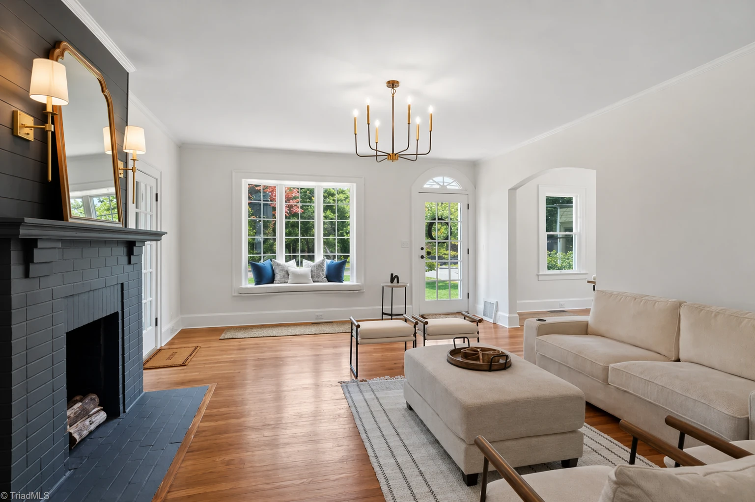 Refinished hardwood floors — Polo Road Dutch Colonial renovation in Winston-Salem, NC